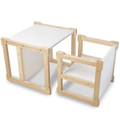 two small wooden tables with white tops