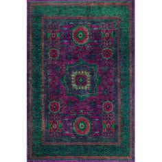 a purple and green area rug with an intricate design on the center, surrounded by smaller circles