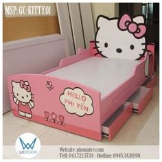 a pink hello kitty bed with drawers in the bottom and side panels on the sides