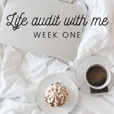 a cup of coffee and a plate on a bed with the words life audiit with me week one