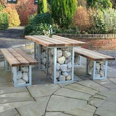 an image of a table and benches made out of firewood on the facebook page