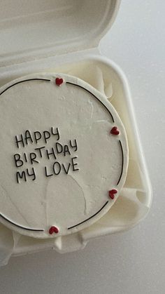 a birthday cake with the words happy birthday my love written on it in a box