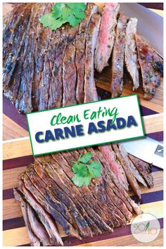 sliced up steak on a cutting board with a sign that says clean eating carne asada