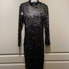 Black, Sequin Dress, Long Sleeve, High Neck With Open Back. Goes A Little Below Your Knees. Never Worn, Brand New. Black Sequin Dress Long Sleeve, Black Sequin Dress Long, Sequin Dress Long Sleeve, Sequin Dress Long, Black Sequin Dress, Dress Long Sleeve, Dresses Black, Black Sequins, Dress Long