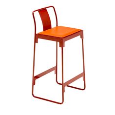 an orange chair sitting on top of a white floor