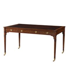 an antique desk with two drawers and brass pulls on the legs, against a white background