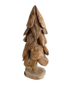 a small wooden christmas tree on a white background