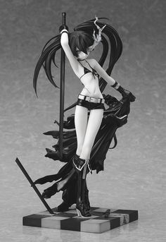 an anime figurine with black hair and blue eyes is posed on a stand