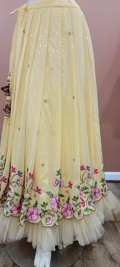 Georgette Sequence Lehenga Set.Lehenga length 41 inchesCrop Top size 34 inches and can be resized to size 38.Crop Top length 15 inches.Product ships immediately within USA. Yellow Cutdana Sets For Reception, Designer Traditional Drape Skirt With Resham Embroidery, Traditional Maxi Length Lehenga With Gota Work, Yellow Cutdana Sharara For Reception, Anarkali Skirt With Resham Embroidery, Yellow Palazzo Set With Dupatta In Traditional Drape, Yellow Palazzo Set With Dupatta For Reception, Yellow Palazzo Set For Reception And Navratri, Yellow Gota Work Sets For Reception