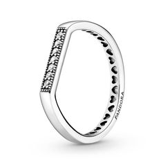 Take your style game up a notch with the Sparkling Bar Stacking Ring. With a geometric shape and minimalist aesthetic, this sterling silver ring features a single row of sparkling clear cubic zirconia stones. Inside the ring, a row of grooved hearts add texture and on the outside, a polished metal shine creates a gorgeous play of light. Its slim silhouette and flat pavé top are designed with stacking in mind, letting you combine this silver stacking ring with other favorites. Pandora Rings, Sparkling Rings, Silver Stacking Rings, Ring Crafts, Gift Pouch, Ring Fit, Perfect Engagement Ring, Ring Size Guide, Stacking Ring