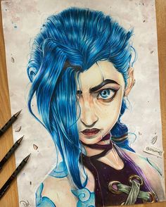 a drawing of a girl with blue hair and piercings on her face, next to some crayons