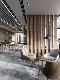 an office with chairs and tables in the middle of it, along with wooden partitions