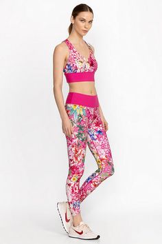 Crafted from a breathable fabric with a hint of stretch, Frame High Waist Eyelet Hem Leggings perfectly combine performance and style. Adorned with bold florals, these leggings feature a high, wide waistband with a hidden zip pocket and intricate laser cut eyelet detailing at the back hemline. Pair with the Frame Cross Back Eyelet Sports Bra from a polished gym look. Johnny Was Women's Bee Active Eyelet Hem Legging in Frame Pink, Size Medium, Floral Colorful Activewear, Gym Look, Frame Pink, Hem Leggings, Boho Chic Outfits, Embroidered Jeans, In Frame, Johnny Was, Bottom Clothes