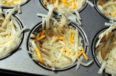 several muffin tins filled with shredded cheese