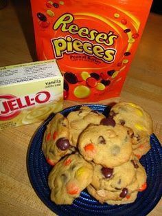 a plate full of cookies next to a bag of jello