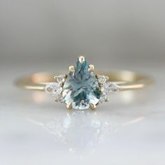 Borealis Light Blue Pear Cut Montana Sapphire Cluster Ring - Gem Breakfast Asymmetrical Engagement Ring, Gem Breakfast, Sapphire Cluster Ring, Montana Sapphire Engagement Ring, Stackable Engagement Ring, Traditional Engagement Rings, Cluster Engagement Ring, Gemstone Engagement, Montana Sapphire