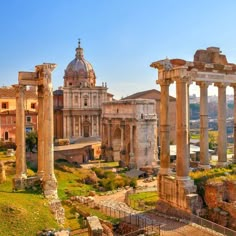 the ruins of an ancient city are shown in this photo, with columns and arches on either side