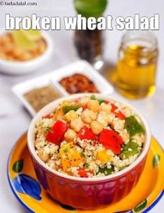 a bowl filled with rice and vegetables on top of a plate