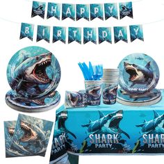 shark birthday party supplies including plates, cups and napkins