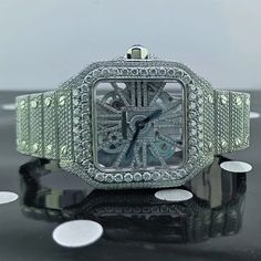 VVS Moissanite Luxury Watch Fully Automatic Diamond Dual Tone Iced Out Hip Hop Buss Down Watch Moissanite Watch iced out watches  Movement: Automatic Movement * Watch Metal: 904 Stainless Steel * Band Metal: 904 Stainless Steel * Indices: Simple Line * Dial Window Material Type: Glass * Water Resistant :- No * * Diamond Details * * * Type: Moissanite * Creation: Lab Made * Shape: Round Brilliant Cut * Clarity: VVS1 (TOP) * Color: D (Colorless / White ) * Cut: Excellent * Polish: Excellent * Our Silver Iced Out Watch Accessories For Gifts, Silver Cubic Zirconia Iced Out Watches, Diamond White Iced Out Watches As Gift, Gift Iced Out Diamond White Watch, Buss Down Watch, Iced Out Watches, Diamond Tester, Band Metal, Swiss Watch