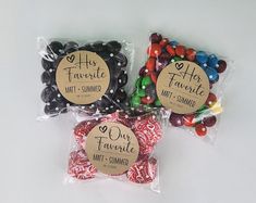 three bags filled with different types of candies