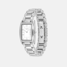 A distinctive stately design the minimalist Reese watch is an elevated choice for everyday. Sparkling with crystals this stainless steel bracelet design features a satin dial detailed with a mix of numerical and stick markers. It’s accented with our Signature on the clasp for a heritage touch. | Coach Reese Watch, 24 Mm X 35 Mm - Women's - Stainless Steel Luxury Diamond Watch With Rectangular Stainless Steel Dial, Luxury Stainless Steel Watches For Everyday, Classic Stainless Steel Diamond Watch With Diamond Hour Markers, Elegant Diamond Watch With Date Indicator, Coach Watches With Diamond Hour Markers And Round Dial, Coach Watch With Diamond Hour Markers, Silver Watch With Metal Dial For Work, Silver Diamond Watch With Palladium Hardware, Elegant Diamond Watch With Rectangular Stainless Steel Dial