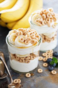 two jars filled with cereal and bananas