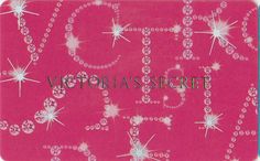 a pink background with white stars and the word victoria's secret written in it