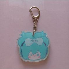 a key chain with a cartoon character on it