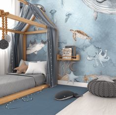 Cozy boy's bedroom with a canopy bed and an expansive undersea wall mural. The mural depicts lifelike illustrations of marine life such as a hammerhead shark, jellyfish, sea turtle, and a playful octopus. The bed is adorned with a grey bedspread, starry grey canopy, and a cushioned pouf nearby, creating an inviting ocean-themed nursery atmosphere Under The Sea Interior Design, Whale Themed Bedroom, Mural In Nursery, Modern Blue Nursery, Under The Sea Bedroom Ideas Boys, Ocean Theme Toddler Room, Modern Ocean Nursery, Ocean Themed Boys Room, Ocean Theme Kids Room