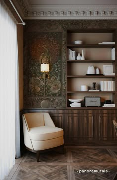 a living room filled with furniture and bookshelves next to a wall mounted book shelf