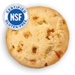 a close up of a cookie on a white background with the nsf logo above it