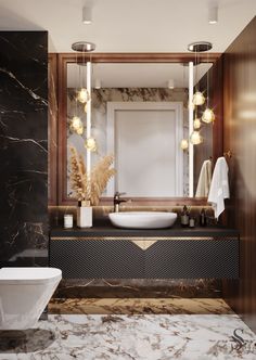 a bathroom with marble floors and walls