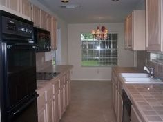 the kitchen is clean and ready for us to use in its new owner's home