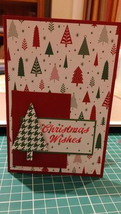 a christmas card with trees on it