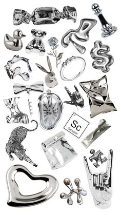 various metal objects are arranged on a white surface, including scissors and other items that appear to have been cut out