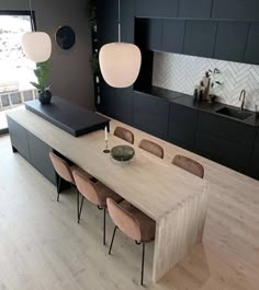 an instagram photo of a dining room and kitchen