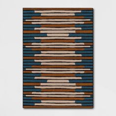 a brown and blue rug with stripes on it