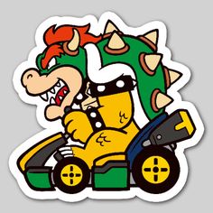 the mario kart sticker is shown on a gray background with an orange and green character