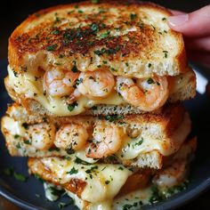 a grilled cheese sandwich with shrimp on it