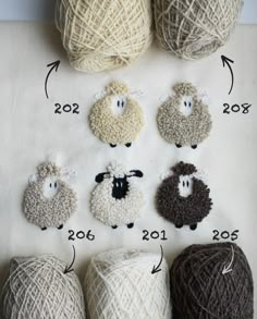 several balls of yarn with sheep faces on them and numbers in the middle one for each