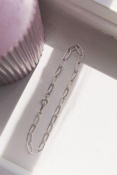 Effortlessly add style with this stunning yet simple piece, the perfect compliment to every outfit. Handcrafted from 925 Sterling Silver, this beautiful cable chain bracelet is the perfect way to add that elegant and subtle look to your wrist. Lightweight in feel and so easy to wear, simply secure with the spring ring clasp. The perfect accessory for daily use. Details: - Length: 7.25 Inches - Material: 925 Sterling Silver - Clasp: Spring Ring - Will arrive beautifully packaged in a luxury jewel Luxury Jewelry Box, Stack Bracelet, Bohemian Style Jewelry, Cable Bracelets, Chain Bracelets, Women Bracelet, Silver Chain Bracelet, Bracelets For Women, Bracelet Silver