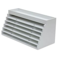 a white shelf with six compartments on each side