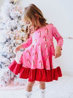 Cotton/Spandex blend Lined bodice Scoop ruffled back Playful Cotton Twirl Dress, Playful Cotton Ruffle Twirl Dress, Toddler Vintage Christmas Dress, Toddler Printed Christmas Dress Dance, Playful Pink Unicorn Print Dress, Flair Dress, Classic Girl, Ribbed Knit Dress, Navy Floral