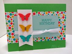 a birthday card with three butterflies on it