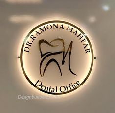 the dental office sign is lit up for customers to see