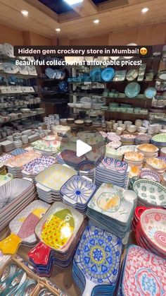 a room filled with lots of plates and bowls