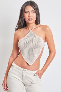 Bring on Summer days! Our Faye Knit Halter Top is the perfect addition to your Summer wardrobe! Featuring a crochet knit material and a sexy cross-back detailing. The ties are adjustable ensuring you with the perfect fit. Dress it up with some matching trousers in the summer, or wear it more casual with your fav YMI denim! Product Details: - Halter Style- Cropped Fit- Triangle Neckline- Crochet Knit Material- Adjustable Tie Back- Model is wearing size Small. Dry clean only.100% Polyester Fitted Knit Halter Top, Fitted Knit Top For Vacation, Trendy Stretch Knit Halter Top, Chic Fitted Knit Top For Beach, Beach Knit Fitted Halter Top, Chic Seamless Crochet Top, Stretch Casual Crochet Halter Neck Top, Beach Fitted Knit Halter Top, Casual Stretch Crochet Halter Neck Top