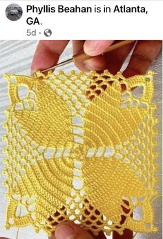 someone is crocheting an afghan in yellow