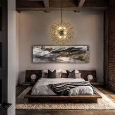 a large bed sitting under a painting in a bedroom